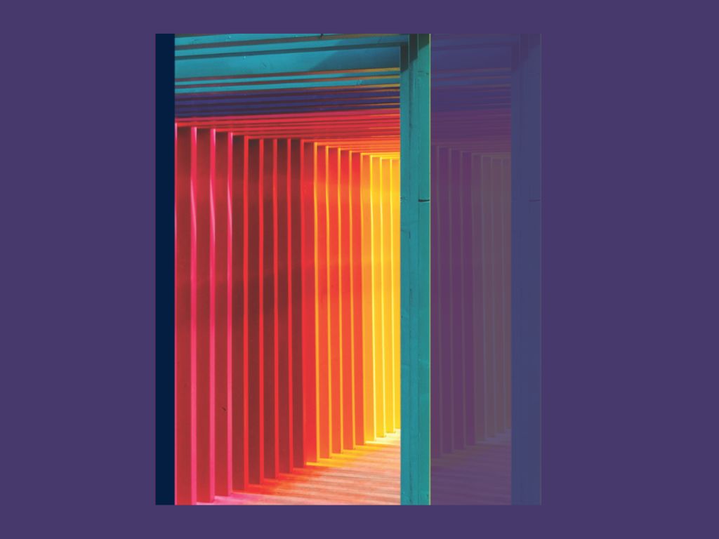 An abstract photo of some doors/door frames in rainbow colors.