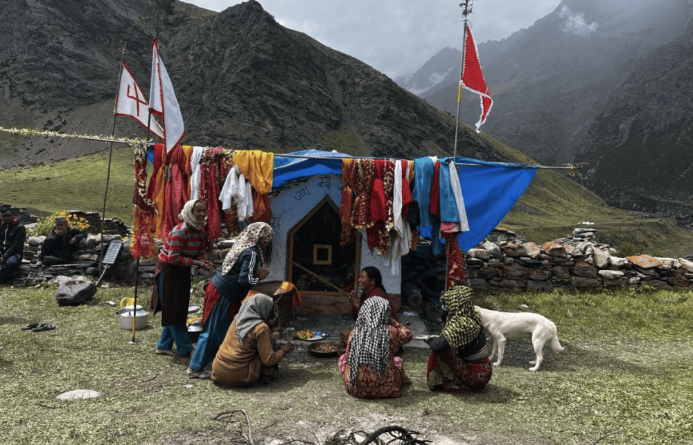 Women gathered in the village temple to pray.